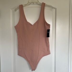 Abercrombie and Fitch bodysuit sleeveless
Size L
Color blush